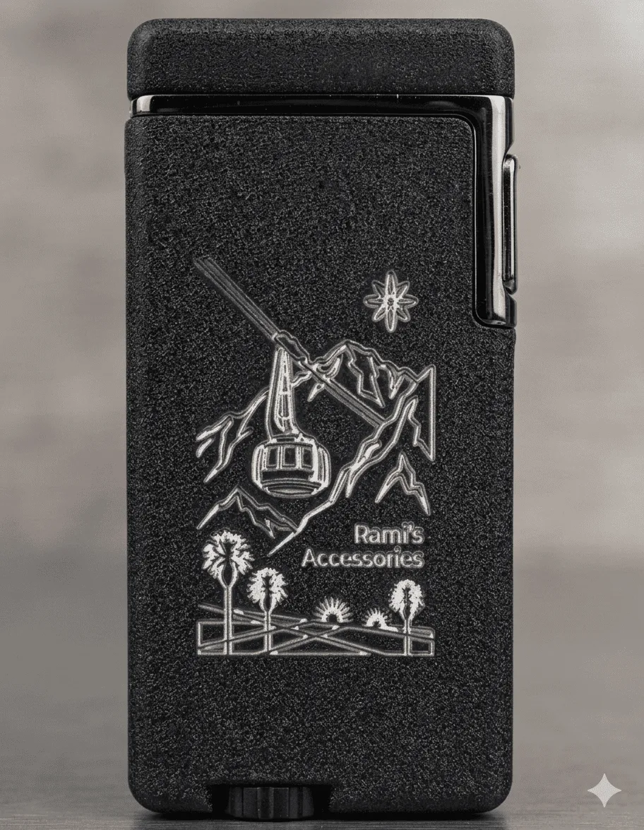 Rami's Tramway Summit Dual Flame Voice-Tap Activated lighter with engraved tramway gondola, mountain peaks, desert palms, and textured black finish.
