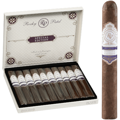 Open box of Rocky Patel Special Edition cigars, showcasing dark, oily Habano wrappers and elegant banding.