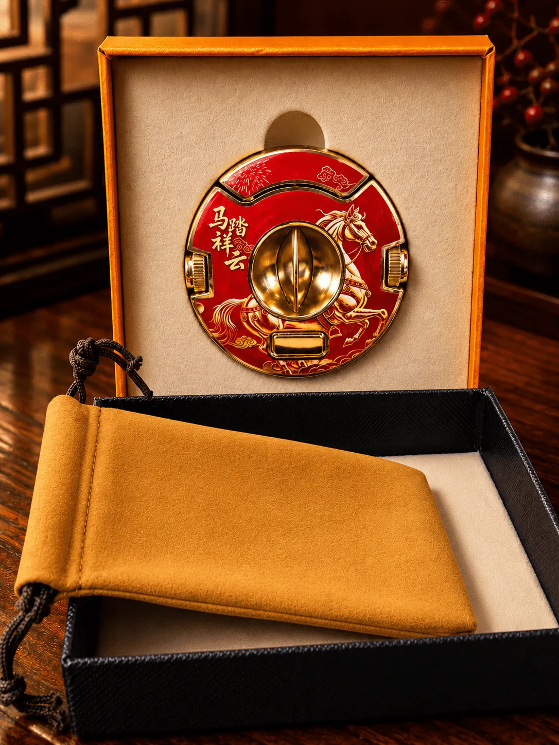 "The Sovereign Horse by Rami limited edition cigar cutter in red and gold finish featuring a V-cutter and dual punch sizes inside a luxury gift box."