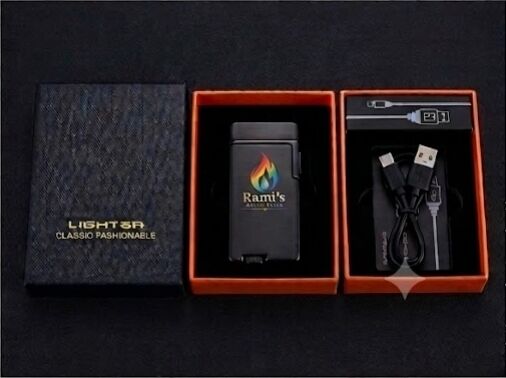 The Rami's Prizm Black Pride Edition lighter presented in its premium branded gift box with an included USB charging cable.