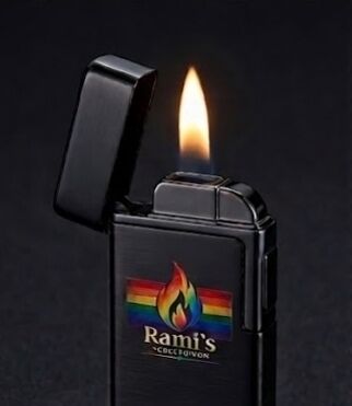 The black Rami's Prizm Black Pride Edition lighter with its lid open, demonstrating a soft flame.