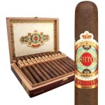Open box of Ashton Symmetry cigars featuring expertly crafted Ecuadorian Habano-wrapped cigars with a rich, dark wrapper and gold band, arranged neatly in a cedar-lined box."