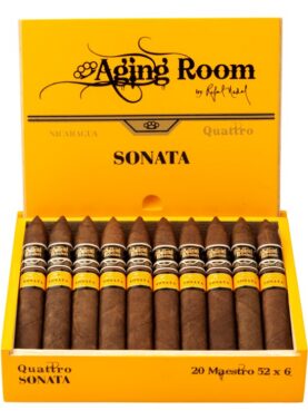 Open box of Aging Room Quattro Sonata Maestro cigars with reddish-brown wrappers and gold-trimmed bands