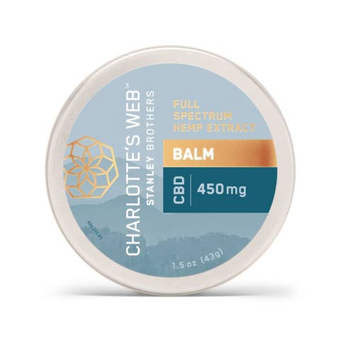 Charlotte’s Web Hemp-Infused Balm tin with 450 mg CBD, featuring natural ingredient labeling and compact design.
