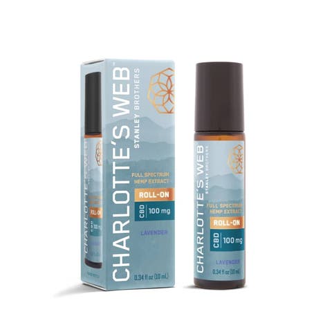 Charlotte’s Web CBD Roll-On bottle with herbal ingredients in background, highlighting its natural, soothing formula.