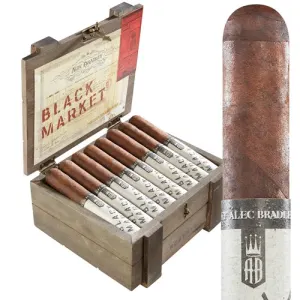 Alec Bradley Black Market cigar standing in front of an open box filled with cigars.