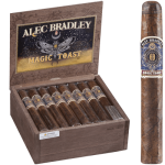 Single Alec Bradley Magic Toast cigar with light brown Connecticut Shade wrapper in front of an open box showing multiple cigars.
