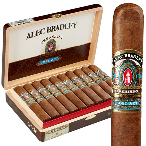 Single Alec Bradley Prensado Lost Art cigar with dark wrapper in front of an open box showing multiple cigars inside.