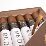 Asylum 13 Medulla Oblongata cigar with a dark, rich wrapper and distinctive band