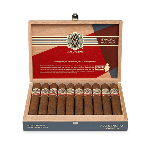 Open box of AVO Synchro Nicaragua cigars displaying rich brown wrappers and vibrant cigar bands.