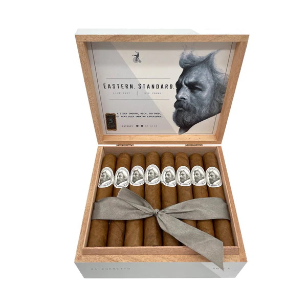 Open box of Eastern Standard cigars featuring silky, light-brown wrappers and sophisticated Caldwell branding