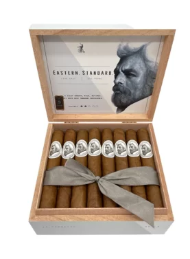 Open box of Eastern Standard cigars featuring silky, light-brown wrappers and sophisticated Caldwell branding