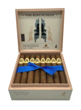 Open box of The King is Dead cigars featuring rustic, dark brown wrappers and bold, modern Caldwell branding.