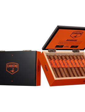 Open and closed boxes of Camacho Nicaragua cigars with bright orange branding and neatly arranged cigars
