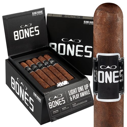 Open box of CAO Bones cigars featuring dark Ecuadorian Sumatra wrappers and poker-inspired branding