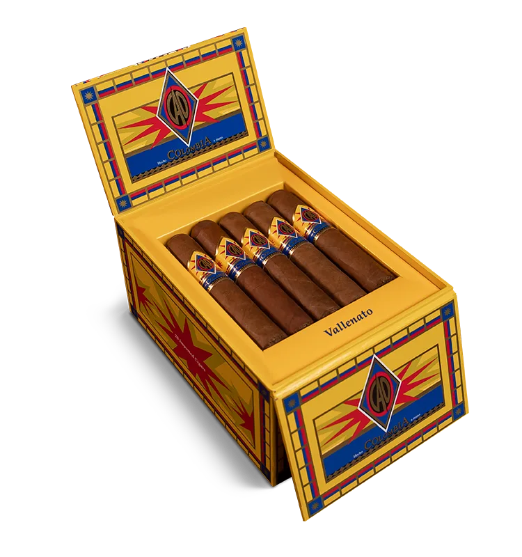 Open box of CAO Colombia cigars featuring rich Honduran wrappers and vibrant Colombian branding.