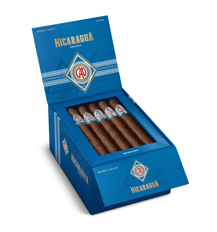 Open box of CAO Nicaragua cigars with rich brown wrappers and bold Nicaraguan branding.