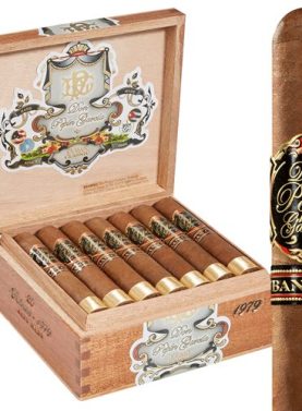 Single Don Pepin Garcia Cuban Classic cigar with open box behind it