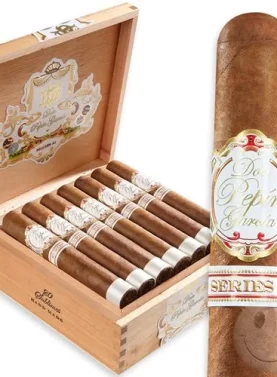 Single Don Pepin Garcia Series JJ cigar with open box behind it