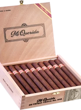 Open box of Mi Querida Triqui Traca cigars with dark, rustic wrappers and elegant banding