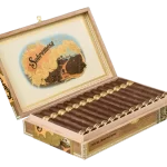 Open box of Sobremesa cigars with dark, oily wrappers and elegant gold-trimmed bands