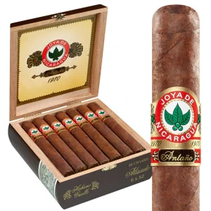 Open box of Joya de Nicaragua Antaño 1970 cigars, showcasing the dark, rich Habano Criollo wrappers and full-bodied strength.