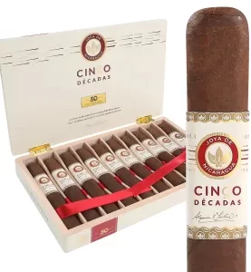 Open box of Joya de Nicaragua Cinco Decadas cigars, showcasing the luxurious dark wrappers and premium craftsmanship
