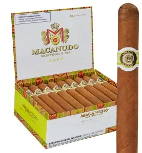 Open box of Macanudo Café cigars with light Connecticut Shade wrappers and elegant branding.