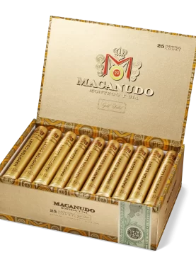 Open box of Macanudo Gold Label Tubo cigars, each individually encased in a gold tube and presented with elegant Connecticut wrappers.