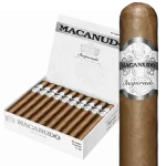 Open box of Macanudo Inspirado White cigars with light Ecuadorian Connecticut wrappers and elegant silver-accented bands.