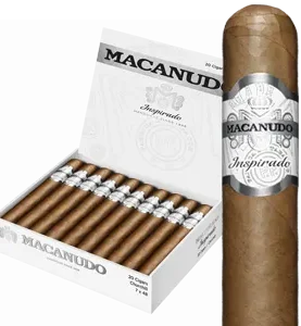 Open box of Macanudo Inspirado White cigars with light Ecuadorian Connecticut wrappers and elegant silver-accented bands.