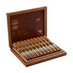 Open box of Montecristo Espada cigars with rich brown Nicaraguan wrappers and detailed gold-accented bands.