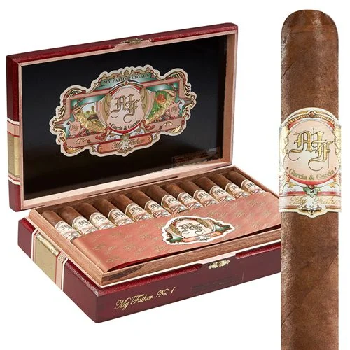 Father cigar in front of open box of cigars