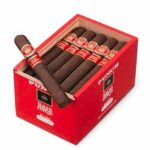Open box of Punch Rare Corojo cigars neatly arranged in rows, showcasing the red and gold bands