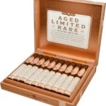Open box of Rocky Patel A.L.R. Second Edition cigars, showcasing beautifully arranged cigars with rich packaging.