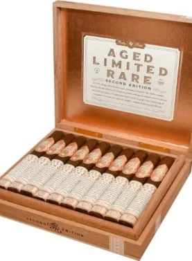 Open box of Rocky Patel A.L.R. Second Edition cigars, showcasing beautifully arranged cigars with rich packaging.