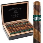 Open box of Rocky Patel The Edge 10th Anniversary cigars with dark Sumatra wrappers and bold commemorative bands.