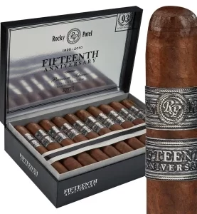 Open box of Rocky Patel Fifteenth Anniversary cigars with dark, box-pressed wrappers and silver-accented bands.