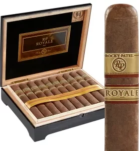 The Rocky Patel Royale is a luxurious, medium to full-bodied cigar that offers a richly complex and smooth smoking experience. Featuring an elegant Ecuadorian Sumatra wrapper over a dual binder of Connecticut Shade and Connecticut Broadleaf, and filled with aged Nicaraguan long-fillers, the Royale delivers a harmonious blend of flavors. Smokers can expect notes of espresso, sweet spice, almond, and leather, all balanced with a creamy finish. Consistently rated among the top cigars in the world, the Rocky Patel Royale is a true connoisseur's choice, ideal for those who appreciate depth, nuance, and impeccable construction.