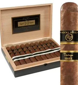 Open box of Rocky Patel Vintage 1992 cigars, showcasing their rich, aged Ecuadorian Sumatra wrappers and neat arrangement.