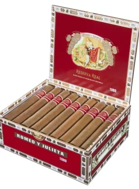 Open box of Romeo y Julieta Reserva Real cigars with neatly arranged cigars showcasing smooth, creamy Connecticut Shade wrappers.