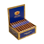 Open box of Romeo y Julieta Reserva Real Nicaragua cigars with dark Habano wrappers and vibrant blue and gold bands.