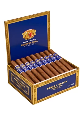 Open box of Romeo y Julieta Reserva Real Nicaragua cigars with dark Habano wrappers and vibrant blue and gold bands.