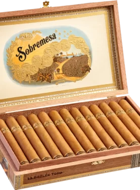 Open box of Sobremesa Brûlée cigars with light Connecticut wrappers and gold-trimmed bands