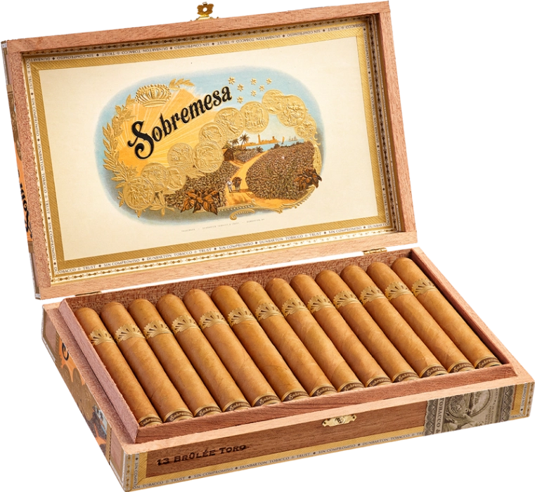Open box of Sobremesa Brûlée cigars with light Connecticut wrappers and gold-trimmed bands