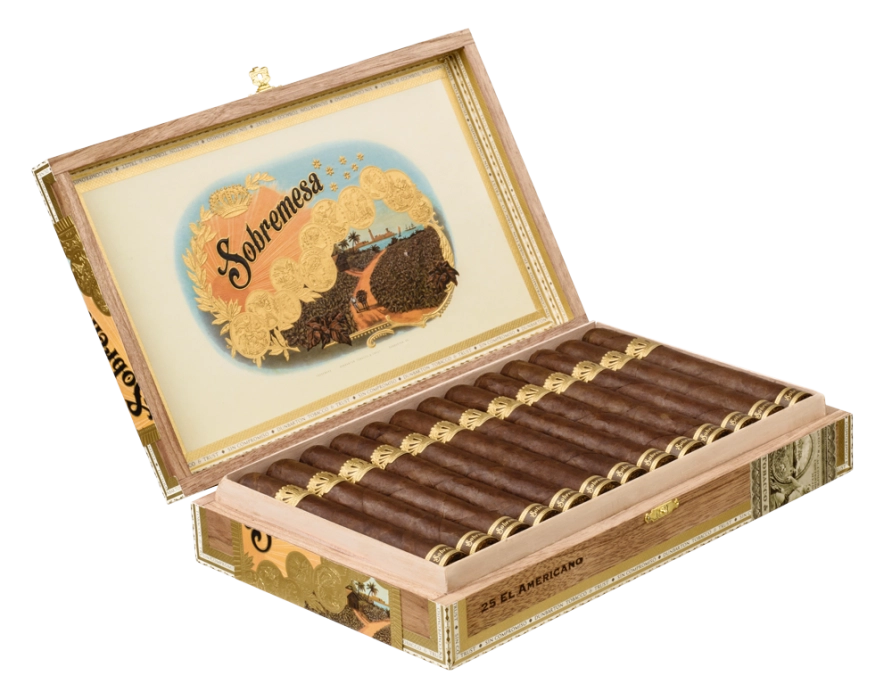 Open box of Sobremesa cigars with dark, oily wrappers and elegant gold-trimmed bands
