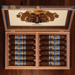 Open box of The Wise Man Corojo cigars, featuring smooth, reddish-brown wrappers neatly arranged in a premium wooden box.