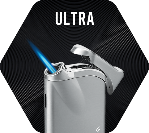 Silver Vector Ultra Lighter with a lit single torch flame.