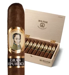 Single Bolivar Gran República cigar in front of an open box filled with matching cigars