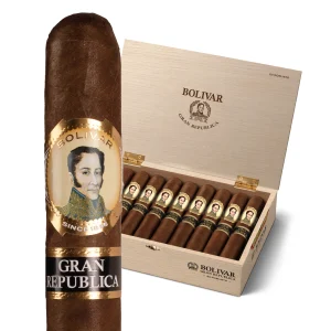 Single Bolivar Gran República cigar in front of an open box filled with matching cigars